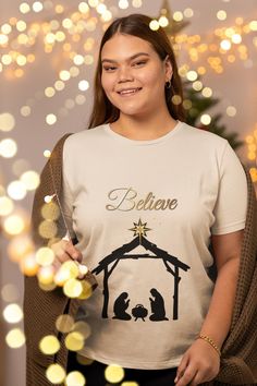 Introducing our beautifully designed Believe T-shirt featuring a serene Nativity Silhouette. This unique and meaningful design is perfect for spreading holiday cheer and embracing the true spirit of Christmas. Made with high-quality materials for a comfortable fit, this T-shirt is sure to become a favorite in your wardrobe. Whether you're attending a Christmas gathering or simply want to showcase your faith, this Nativity Silhouette T-shirt is the perfect choice. Add a touch of inspiration to yo Jesus Birthday Shirt, Nativity Silhouette, Christian Merch, Jesus Birthday, Holiday Apparel, True Meaning Of Christmas, A Child Is Born, Christmas Gathering, Birth Of Jesus