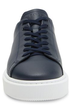 Streamlined and crisp, this low-top sneaker is a forever-chic style that's as luxe as it is low-key. Lace-up style Leather upper/textile and leather lining/rubber sole Imported Classic Platform Sneakers With Contrast Sole, Casual Synthetic Sneakers With Stitched Sole, Modern Stitched Sole Sneakers For Streetwear, Classic Low-top Platform Sneakers With White Sole, Modern Low-top Custom Sneakers For Everyday, Modern Low-top Platform Sneakers With Contrast Sole, Modern Low-top Platform Sneakers With White Sole, Modern Everyday Platform Sneakers With Round Toe, Modern Low-top Sneakers With Stitched Sole