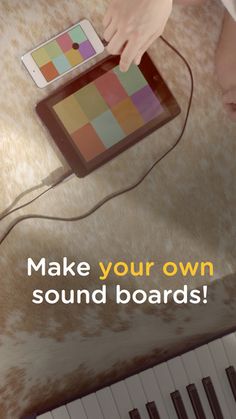 a person using a tablet on top of a piano keyboard with the words make your own sound boards