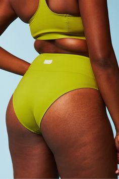 High-Waisted Cross Over Swim Bottom Fabletics green female Activewear >> Womens >> Swim >> Bottoms regular Swim UPF Protection High Waist Seamless Green Bottoms, Fitted Green Swimwear With Contoured Waistband, Green High Stretch Summer Activewear, Green Compressive Athleisure Bottoms, Green Stretch Swimwear With Contoured Waistband, Green Swimwear With Wide Waistband, Green Stretch Swimwear With Wide Waistband, Green High-cut Leg Stretch Swimwear, Compressive Seamless Green Bottoms