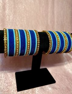 Blue & Gold Bangles - Etsy Adjustable Blue Cuff Bracelet For Party, Blue Bangle Cuff Bracelet For Party, Traditional Blue Adjustable Cuff Bracelet, Blue Traditional Bangle For Festive Occasions, Traditional Adjustable Blue Bangle, Handmade Blue Cuff Bracelet For Party, Blue Festive Bangle Jewelry, Traditional Blue Bangle For Party, Elegant Blue Bracelets For Festive Occasion