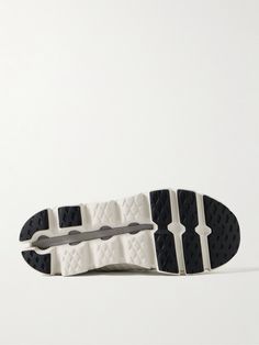 the sole of a white and black sneaker