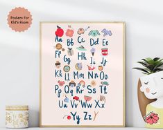 a poster with letters and numbers on it next to a potted plant