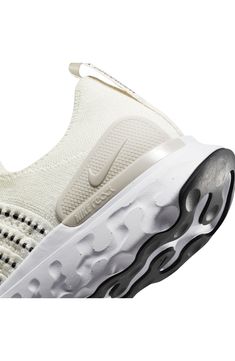 Breathable and lightweight, this sock-fit running shoe pairs a flexible, supportive Flyknit upper with an energy-returning Nike React foam sole. Molded heel plates and targeted rubber in the tread help deliver distraction-free comfort and traction through every stride from heel strike to toe-off. Cushioning: absorbs impact and distributes weight for consistent, buoyant comfort under each step Lightweight: puts cushioning and performance underfoot with an emphasis on streamlined comfort Lightweig Sporty Lightweight White Running Shoes, Sporty White Lightweight Running Shoes, Nike Comfortable Breathable Running Shoes, Lightweight Running Shoes With Branded Insole For Sports, White Lightweight Low-top Running Shoes, Lightweight Breathable White Running Shoes, White Lightweight Breathable Running Shoes, White Lightweight Athleisure Sneakers, White Breathable Textile Running Shoes