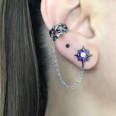 SOLD AS SINGLE OR PAIR You asked, we listed! We combined Star stud with Thorn ear cuff for this striking earring. Earring is made of 316 Stainless steel and  set with Black and Purple CZ. Cuff needs no piercing, just slide on the ear. This cuff fits both right and left ears.  Length of the chain: 57 mm Star Stud: 16 mm long, 11.5 mm wide Cuff: 9 mm wide Matching stud available here : https://www.etsy.com/listing/1102230605/purple-star-earrings-starburst-earrings?click_key=7ef06a3d6a13babb4dc5c77ed6e0bae261653909%3A1102230605&click_sum=97626eba&ga_search_query=starburst&ref=shop_items_search_10&pro=1&sts=1 https://www.etsy.com/listing/766720221/north-star-earrings-north-star-studs?click_key=63fed3126fef09e192c086ef740756bdf7fea537%3A766720221&click_sum=b43eccbb&ga_search_query=starburst&ref Edgy Silver Star-shaped Jewelry, Silver Metal Punk Ear Cuff, Emo Style Pierced Metal Earrings, Silver Punk Style Metal Ear Cuff, Silver Edgy Ear Cuff For Party, Edgy Silver Ear Cuff For Party, Silver Edgy Single Ear Cuff, Silver Edgy Body Jewelry Gift, Silver Star-shaped Pierced Cartilage Earrings