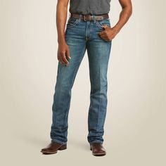 Ruggedly handsome and supremely comfortable, these jeans are ready for wherever the day (or night) takes you. Our straight leg M5 is fitted through the hip and thigh for a modern yet classic look. M5 Slim Boundary Stackable Straight Leg Jean | Men's M5 Slim Boundary Stackable Straight Leg Jeans in Gulch, Size: 44 X 30 by Ariat Rugged Fitted Washed Jeans, Fitted Rugged Jeans In Medium Wash, Western Style Medium Wash Cotton Jeans, Western Style Cotton Jeans In Medium Wash, Classic Medium Wash Jeans For Rodeo, Rugged Medium Wash Jeans For Rodeo, Straight Leg Jeans Men, Favorite Boots, Classic Looks