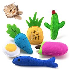 several stuffed animals are arranged in the shape of cactuses, pineapples, and an egg