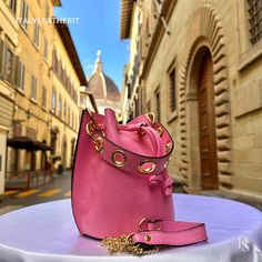 This bag has been made of the best genuine leather by local master crafters of Florence in Italy, designed for women who only accept premium Italian quality and luxury leather bags and modern Italian fashion. . Sizes: Height: 20 cm/7.8inch Length: 16 cm/6.29inch Width: 16 cm/6.29inch . The story of this bag: Gianni was on a mission to find the perfect birthday gift for his daughter. He wanted to surprise her with something special, something that reflected her unique personality and style. As he Designer Pink Shoulder Bag With Leather Lining, Designer Pink Bag With Leather Lining, Modern Pink Bags With Leather Lining, Luxury Leather Bucket Bag With Smooth Grain, Designer Leather Bucket Bag As Gift, Luxury Bucket Shoulder Bag As Gift, Luxury Bucket Shoulder Bag Suitable For Gifts, Luxury Bucket Shoulder Bag Perfect For Gifting, Luxury Bucket Shaped Shoulder Bag As A Gift