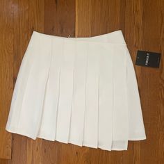 Brand New Never Worn Asymmetrical Pleated Tennis Skirt. Very Cute And Trendy For The Spring /Summer Months! Asymmetrical Skort, Tropical Skirt, Silk Wrap Skirt, Rayon Skirt, Ralph Lauren Skirts, Pleated Tennis Skirt, Wrap Maxi Skirt, Tie Dye Maxi, Free People Skirt