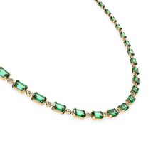 A multigem diamond necklace composed of lab-grown gemstones and diamonds. Available in sea-blue and green options, it epitomizes simplicity and luxury. Evoking the opulent ambiance of a seaside retreat, it radiates brightly against the serene ocean backdrop. ?| Gold Color: 18K Gold Vermeil (Not to be confused with regular gold plating, our vermeil is a thick layer of 18k solid gold on sterling silver meaning it will last longer. You get the look & feel of gold jewelry at a fraction of the price) Luxury May Birthstone Necklace With Diamond Accents, Luxury Emerald Stone Necklaces, Luxury Emerald Necklace With Stones, Luxury Cubic Zirconia Necklace For May Birthstone, Elegant Green Baguette Cut Necklace, Elegant Emerald Necklace With Gemstone Accents For May Birthstone, Elegant Emerald Necklaces With Gemstone Accents, Luxury Emerald Necklace With Gemstone Accents, Elegant Necklaces With Gemstone Accents For May Birthstone