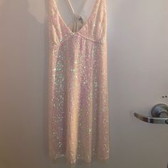 This Is A Shimmery Iridescent Dress From Free People. It Reminds Me Of A Ballet Dress. It Is Adjustable And Tied In The Back. V-neck Shimmer Mini Dress For Spring, V-neck Shimmer Dresses For Spring, Iridescent Shimmer Dress For Parties, Glamorous Iridescent Shimmer Dress, Iridescent Sleeveless Summer Dress, Pink Sequin Shimmer Dress For Summer, Iridescent Sequin Dress For Night Out, Iridescent Dresses For Summer Parties, Iridescent Shimmer Evening Dress