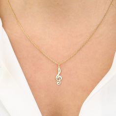 "Add a luxurious touch to your jewelry collection with this beautiful 14k Gold Treble Clef Necklace. A classic piece of jewelry for music lovers and those passionate about music, this chic pendant is crafted from solid 14K gold. The perfect gift for special occasions, such as Teachers' Day, or for your special someone, this beautiful piece of jewelry is sure to make an impression. Hidden content is love designed by PortoFineJewelry 🧤 Handmade All products are carefully crafted special designs. Feature that distinguishes our store from general jewelry stores are especially personalized designs, colored gemstones and diamond rings that are available for special occasions such as weddings, engagements and birthdays. We make new designs by following the trends with modern touches and prepare Personalized Gold Music-themed Jewelry, Music-themed Yellow Gold Jewelry Gift, Musical Note Jewelry, Sol Key, Treble Clef Necklace, Gold Bar Earrings Studs, Pretty Jewelry Necklaces, Colored Gemstones, Treble Clef