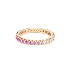 a yellow gold ring with pink and white stones