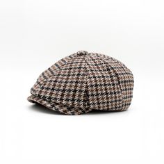 a brown and black plaid hat on a white background