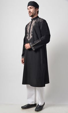 Fabric is 100% cotton Poplin Front button down Mandarin collar Front yoke and sleeves embroidered Length is 42-44" Side Pockets Machine wash cold with like colors and tumble dry Black Cotton Long Sleeve Kurta, Embroidered Long Sleeve Winter Kurta, Winter Embroidered Long Sleeve Kurta, Winter Traditional Wear With Chikankari Embroidery And Long Sleeves, Traditional Floral Embroidered Kurta For Winter, Black Cotton Traditional Wear With Long Sleeves, Traditional Wear With Floral Embroidery And Long Sleeves, Casual Festive Traditional Wear With Long Sleeves, Black Cotton Long Sleeve Traditional Wear