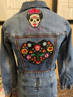 Frida jacket size S Forever 21, cropped 61% cotton, 35% polyester, 3% other bobbers, 1 % spandex Back is adorned with a large floral embroidered patch, floral trim, and machine embroidered Frida. The front yoke is a realistic cotton fabric depiction of the lovely artist. Fitted Cotton Cropped Jacket, Summer Cropped Cotton Denim Jacket, Cropped Cotton Denim Jacket For Summer, Fitted Medium Wash Cropped Jacket With Pockets, Fitted Cropped Jacket With Pockets In Medium Wash, Fitted Medium Wash Cropped Long Sleeve Jacket, Trendy Fitted Cotton Outerwear, Trendy Stretch Cotton Denim Jacket, Trendy Fitted Cropped Jacket