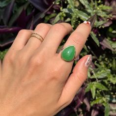 Estate 14KT yellow gold teardrop/ pear, large jade bezel-set band ring. Beautiful, vibrant, dyed green jade! Size 7 Weight: 3.73 grams Band width: 2mm Genuine jade measures: 20mm x15mm Stamped 14KT Excellent estate condition Green Teardrop Ring For May Birthstone, Teardrop Green May Birthstone Ring, Green Teardrop May Birthstone Ring, Green Teardrop Emerald Ring For May Birthstone, Green Teardrop Fine Jewelry Ring, Jade Ring, Green Jade, Jade Green, Bezel Setting