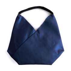 The asymmetric design with the bevel triangle gives this super light bag a pyramidal shape, great styles for this straight shoulder bag. The soft, flexible strap can be worn wide or this to accommodate any shoulder shape for a comfortable fit against the body. This bag features 1 main compartment closes with magnet snap, 1 additional internal zipped pocket, and 1 additional internal open cellphone pocket. Modern Triangle Bag With Detachable Strap, Versatile Triangle Bags For Daily Use, Versatile Everyday Triangle Shoulder Bag, Versatile Daily Use Triangle Bag, Chic Triangle Shoulder Bag For Everyday Use, Chic Triangle Shoulder Bag For Everyday, Chic Everyday Triangle Shoulder Bag, Modern Triangle Shoulder Bag With Removable Pouch, Modern Triangular Shoulder Bag With Removable Pouch