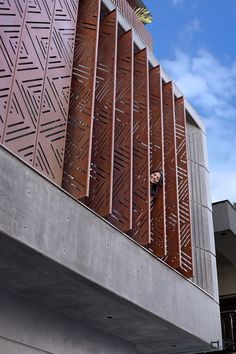 a person climbing up the side of a building