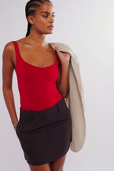 So sleek curve-hugging bodysuit featuring a dipped neckline and low U-back. * Stretch fit * Built-in shelf bra * Snap button thong | Clean Lines Bodysuit by Intimately at Free People in Red, Size: M/L Fitted Low-cut Tank Top With Built-in Bra, Fitted Bodysuit With Boning, Elegant Fitted Bodysuit With Scoop Back, Fitted Backless Bodysuit With Built-in Bra, Fitted Seamless Red Bodysuit, Fitted Red Seamless Bodysuit, Fitted Scoop Neck Bodysuit With Bra Friendly Design, Fitted Scoop Neck Bodysuit Bra Friendly, Fitted Smoothing Backless Bodysuit