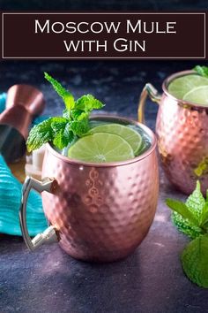 two moscow mules with mint garnish in copper mugs