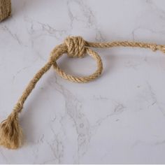 the rope is tied up on the marble counter top