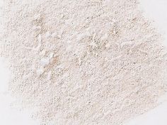 a close up of a white powdered surface