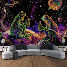 a living room with a couch and large wall mural depicting two frogs sitting on top of each other