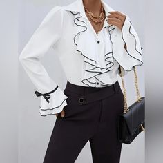 The Stylish Ruffle Trim Blouse Is An Elegant Choice With A Single-Breasted Flare Sleeve Design, Featuring A Soft Contrast Trim. It Is Ideal For Both Spring And Fall, Making It A Perfect Addition To Women's Everyday Wear. True To Size Xxl/14 Bust 42.-44 Waist 34-36 100% Polyester No Sheer Casual Style V Neck Passion Of Essence Boutique White Office Lady Blouse For Party, White Ruffled Tops For Office, Elegant Ruffled Tops For Office, White Ruffled Blouse For Office, Long Sleeve Ruffled Blouse For Office, Long Sleeve Ruffle Blouse For Office, Spring Office Wear Tops With Ruffles, Fitted Ruffle Blouse For Office, Chic Office Blouse With Ruffles