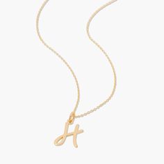 Add a personal touch to your next outfit with the Nella Initial Pendant. Simple and classic, this custom necklace will become a new daily staple. Available in sterling silver, 18k gold plated or 18k rose gold plated silver Initial size: 1/2" tall, width varies 16" cable chain with 2" extender This is an uppercase only font, lowercase letters entered will be produced as uppercase This item is FINAL SALE and ships 3-5 business days from the order date SKU: BYN1138 Gold Sterling Silver Initial Necklace For Everyday, Personalized Sterling Silver Chain Necklace, Elegant Personalized Sterling Silver Chain Necklace, Elegant Personalized Chain Necklace For Everyday, Elegant Everyday Name Necklace With Cable Chain, Classic Name Necklace Pendant For Everyday, Gold Sterling Silver Initial Necklace With Cable Chain, Rose Gold Sterling Silver Initial Necklace With Adjustable Chain, Sterling Silver Initial Necklace With Adjustable Chain For Everyday