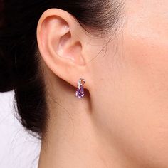 With a hint of vintage styling, these 10K rose gold earrings are sure to please. Each genuine amethyst is topped with a delicately detailed loop adorned with diamond accents.Stones: 9x6mm pear-shaped genuine amethystOther Stones: Diamond accentsDimensions: 13mm longFeatures: Quick ShipDiamond Clarity: I2-I3Earring Back: FrictionSetting: ProngStone Cut: RoundDiamond Color: H-IMetal Color: RoseRounded Carat Weight: Less Than 1/10 Ct.t.wCare: Wipe CleanAuthenticity: Genuine StoneBirthstone: Februa… Rose Gold Drop Earrings, Vintage Styling, Earrings Stud, Gold Drop Earrings, Rose Gold Earrings, Earrings Color, Pear Shaped, Color Purple, Gold Earrings