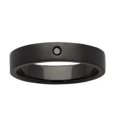 a black wedding band with a diamond in the center and an inside circle on top