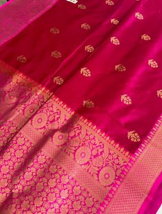 ships from USA.Fall and pico done. comes with blouse piece. Indulge in the opulence of our Handloom Katan Banarasi Silk Saree, a true testament to the exquisite craftsmanship of Banaras. This saree features the finest Katan silk, meticulously woven by skilled artisans to create a fabric that is both rich in texture and vibrant in color. Perfect for weddings, festive celebrations, or any special occasion, this saree promises to make you the center of attention. Material: Premium Katan Banarasi Si Elegant Silk Salwar Kameez For Traditional Ceremonies, Elegant Silk Anarkali Set For Traditional Ceremonies, Brocade Unstitched Suit With Dupatta For Wedding, Wedding Anarkali Unstitched Brocade Suit, Silk Anarkali Set With Cutdana For Puja, Elegant Silk Lehenga With Motifs, Brocade Saree For Ceremonial Use During Diwali, Elegant Unstitched Suit For Traditional Ceremonies And Festive Season, Elegant Pink Anarkali Set For Traditional Ceremonies