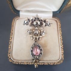 Antique three-part brooch pin in vermeil (gold plated sterling silver, not hallmarked, tested) adorned with faceted pyrites in different configurations and a dropcshaped pink glass paste stone.   Fine and rare piece of the 18th century Georgian jewelry.  Dimensions: 4,3 x 2,7 cm / 1,7" x 1"  Weight: 7,3 gr  Good antique condition, traces of use consistent with age. I'm happy to combine shipping costs if you buy more than one item. Import duties, taxes, and charges are not included in the item pr Georgian Jewelry, Pink Glass, Gold Plated Sterling Silver, Brooch Pin, Georgia, Gold Plate, Plating, Electronic Accessories, Purses And Bags