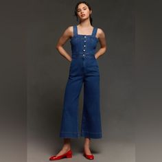 The Portside Button-Front Jumpsuit Is Your Ready-For-Anything One-Piece Wonder. Pack It For Your Travels, Wear It To Work, Go To The Grocery Store - No Outing Is Too Small For This High-Achieving Treasure. 84% Cotton, 10% Lyocell, 5% Elastomultiester, 1% Elastane Front Slant Pockets Back Welt Pockets Button Front Machine Wash Imported Dimensions Standard: 13" Rise 27" Inseam 12.5" Leg Opening Petite: 12.5" Rise 25" Inseam 12.5" Leg Opening Tall: 13.5" Rise 30" Inseam 12.5" Leg Opening Maeve This Chic Wide Leg Jumpsuits And Rompers With Buttons, Chic Wide Leg Jumpsuits With Buttons, Spring Workwear Denim Jumpsuit With Buttons, Chic Button-up Denim Jumpsuit For Work, Chic Denim Jumpsuit For Work With Buttons, Fitted Wide Leg Overalls For Workwear, Denim Overall Jumpsuit With Buttoned Pockets For Work, Button-up Denim Jumpsuit For Work, Chic Medium Wash Overalls For Workwear