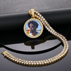 Our customized photo pendant and hip hop necklace is an iced-out necklace made from 18K gold plated and AAAAA Cubic Zirconia. It allows you to honor your loved ones, friends, and pets by using their photos on the pendant which brings good memories every moment. The Pendant comes with a rope necklace. You can make your own pendant by uploading high-quality photos that can be cropped and customized for you. Hip Hop Necklace, Good Memories, Photo Pendant, Cz Pendant, Rope Necklace, Custom Necklace, Gold Plated Silver, Cz Stone, Charm Necklace