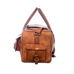 Trustpilot This weekender duffle bag has four big pockets in the exterior with buckle closure. This travel bag is made of genuine goat leather which gives it a rustic look which is for everyone who is looking for something heavy-duty but with good looks. This bag has three compartments, one big compartment for all your clothes and shoes, two small compartments with a zipper for all of your accessories. Salient Features Color: Light Brown Heavy handle and adjustable shoulder strap Genuine goat le Vintage Travel Bag With Multiple Pockets, Brown Leather Duffle Bag With Pockets, Rectangular Duffle Bag With Pockets For Trips, Rugged Adventure Bag With Pockets, Leather Travel Bag With Pockets, Leather Duffle Bag With Pockets For Overnight Trips, Rectangular Weekender Bag With Pockets For Trips, Rugged Large Capacity Rectangular Travel Bag, Leather Bags With Pockets For Weekend Trips