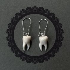 Thank you for visiting my shop. 🦷  New pearly white glossy teeth earrings:  Please know that because they are made to order, all the new ones will not look exactly the same from the pictures. Also there will always be some finger prints visible as shown in pictures since I hand make everything, they may not be too obvious but if you look into it, they could be seen, although I think they make the jewelleries unique. 😎 ⬇️More teeth earring styles here⬇️:  🦷White teeth:  https://www.etsy.com/uk/listing/866553006/florence-original-new-handmade-clay?ref=shop_home_active_2&frs=1 🦷Translucent teeth:  https://www.etsy.com/uk/listing/1174593131/florences-original-handmade-clay?ref=shop_home_active_3&frs=1&crt=1 🦷Teeth studs:  https://www.etsy.com/uk/listing/1028577464/rotten-tooth-earring-stu Pearly White Teeth, Teeth Earrings, Physical Manifestation, Tooth Earrings, Trinket Jar, Piercings Ideas, Fairy Earrings, Earring Styles, Fairy Jewelry