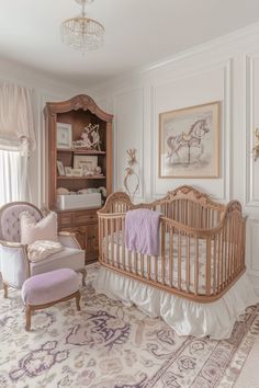 a baby's room with a crib, chair and bookcase in it