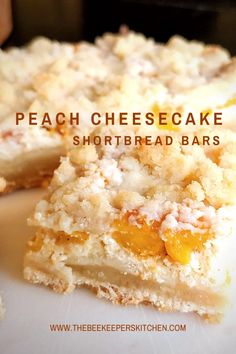 peach cheesecake shortbread bars are stacked on top of each other and ready to be eaten