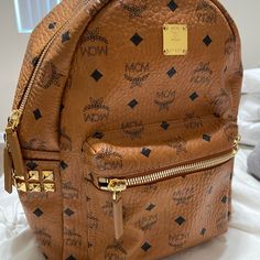 Only Used Once No Longer Want It Luxury Backpack With Removable Pouch For Errands, Designer Backpack With Gold-tone Hardware, Luxury Backpack With Zipper Closure For Errands, Designer Backpack With Gold-tone Hardware For Everyday Use, Luxury Leather Crossbody Backpack For Errands, Jelly Bags, Small Backpack Purse, Mcm Backpack, Studded Backpack