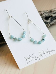 Beautiful Larimar gemstone tiny nugget beads on Sterling silver teardrop hoop. These hang approx. 2.5 inches in length from solid Sterling Silver ear wires. All of our handcrafted items arrive wrapped, perfect for gift giving! Made in the USA. Diy Hanging Earrings, Jewelry Smithing, Boho Earrings Diy, Dyi Earrings, Beaded Jewelry Earrings, Homemade Earrings, Jewelry Making Earrings, Clay Inspiration, Earring Making