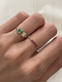 The Quint Ring is one of my favorite stackers to have in your jewelry box. Effortless and cool with a splash of color PLUS an approachable price point - divine! Your choice of 14k yellow, rose or white gold Your choice of ruby, emeralds, or sapphires Total Carat Weight: Diamonds: 0.05 Colored Stones: 0.16 Additional sizes and color ways available upon request, please email info@annapjay.com to inquire Stack it or wear it on it's own... you'll find yourself reaching for it again and again Dainty Emerald Ring, Ruby Jewelry Ring, Sapphire Rose Gold Ring, Gemini Ring, Aesthetic Ring, Stone Ring Design, Simple Diamond Ring, Fancy Design, Accesories Jewelry