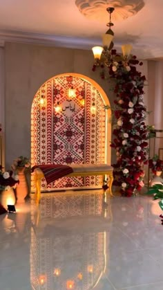 a room decorated with flowers and lights for a wedding ceremony or reception in white marble flooring