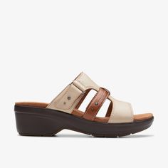 WOMENS Tuleah Jane Sand Combination Wedges | Clarks US Beige Slide Sandals With Cushioned Footbed, Beige Cushioned Slide Sandals, Comfortable Beige Sandals With Ortholite Insole, Beige Slip-on Sandals With Arch Support, Comfortable Beige Slides With Removable Insole, Beige Slides With Arch Support And Round Toe, Beige Sandals With Arch Support For Vacation, Beige Slide Sandals With Leather Footbed, Beige Leather Footbed Slide Sandals