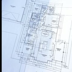 a blueprint shows the floor plan for a new apartment building, which is currently under construction