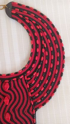 SALE African Choker necklace, Leather choker necklace, Zulu necklace, Beaded necklace, Adjustable necklace, Women jewelry, An authentic elegant necklace that can match with any outfit. 100% handmade Closure: hooks Color: Black and Red. Available in different colors. 3-5 days delivery via DHL Express The shipping fee is for the first item only and additional necklaces or items ship for free.Buy multiple items and pay shipping for 1 item only.The rest ships free.) Wholesale available at a fair pri Traditional Red Necklaces With Black Beads, Traditional Red Necklace With Black Beads, Handmade Red Beaded Choker Necklace, Unique Red Choker As A Gift, Unique Red Choker For Gift, Adjustable Red And Black Beaded Necklace, Red Beaded Chain Choker Necklace, Adjustable Red Beaded Necklace With Black Beads, Red Choker Necklace With Colorful Beads