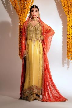 Yellow Mehndi Dress in Kameez Trouser Dupatta Style Bollywood Style Sharara With Naqshi For Reception, Floor-length Naqshi Sharara For Reception, Floor-length Raw Silk Dupatta With Naqshi Detail, Naqshi Georgette Anarkali Set For Reception, Georgette Anarkali Set With Naqshi For Reception, Anarkali Sharara With Naqshi For Reception, Bollywood Style Gown With Naqshi For Reception, Floor-length Salwar Kameez With Naqshi For Weddings, Floor-length Lehenga With Naqshi For Reception