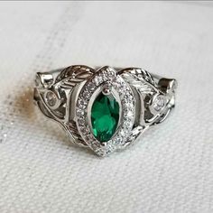 New 925 Silver Filled Marquise Cut Emerald Diamond Leaf Ring For Women Stamped 925. All Gemstones Are Simulated. A Jewelry Box Included. Ready To Ship Same Day. Measurements Shown In The Pictures. Feel Free To Ask Any Question. All Photos Are Real Time From Actual Object No Stock Photo Used. Color Might Be Slightly Different Due To Lighting. Silver Emerald Birthstone Ring With Accent Stones, Silver Emerald Ring With Accent Stones For May Birthstone, Classic Silver Emerald Ring With Accent Stones, Silver Emerald Ring With Halo Setting, Sterling Silver May Birthstone Ring With Halo Setting, Classic Silver Emerald Birthstone Ring, Silver Sterling Silver Emerald Ring For Formal Occasions, Silver Emerald Birthstone Ring With Gemstone, Silver Emerald Jewelry With Center Stone