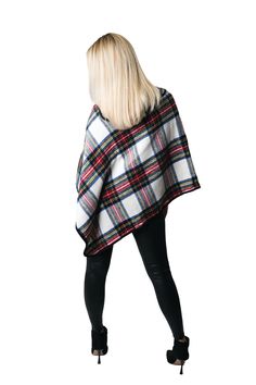 New! Transform your wardrobe with our Blake Poncho! This versatile medium weight poncho is perfect for cool autumn weather. Featuring large wooden buttons and timeless plaid patterns, it's a must-have for any fashionista. The envelope neckline extends over the back of the shoulder, providing a comfortable and stylish neckline. Dress it up or down and complete your look with our coordinating hats and gloves. Details & Care One Size 35"L from shoulder to point 39"W 9.75"L envelop collar 100% Polye Winter Plaid Poncho, Plaid Winter Poncho, Casual Plaid Poncho For Winter, Oversized Plaid Poncho For Fall, Cool Autumn, Autumn Weather, Rain Poncho, Travel Dress, Neckline Dress